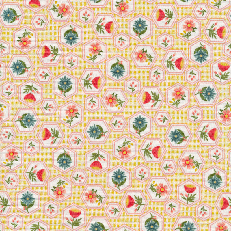 Fabric with bright flowers in hexagons all over a pale yellow background