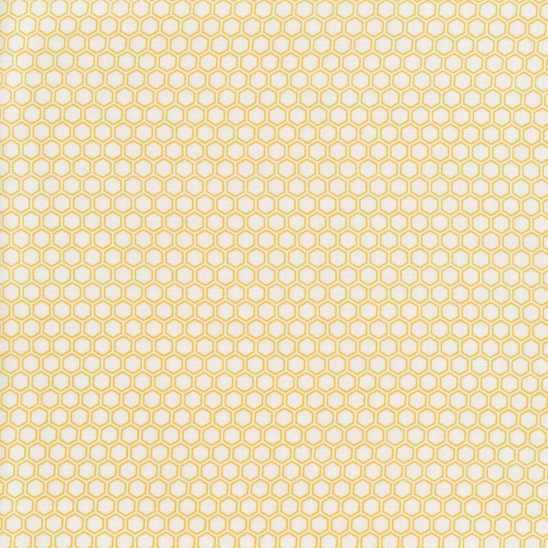White fabric with yellow hexagon shapes all over