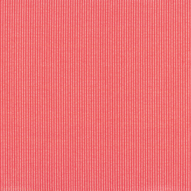 Pink fabric with columns of tiny white squares