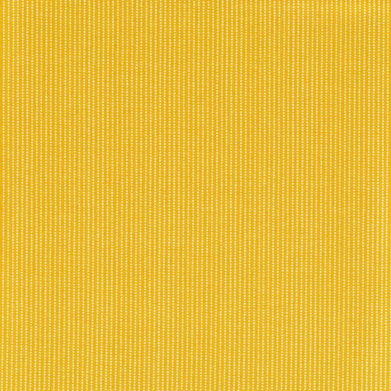 Bright yellow fabric with columns of tiny white squares