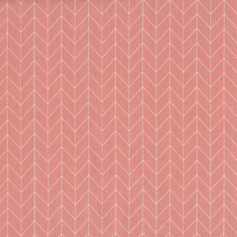 Pink fabric with white chevron pattern designs
