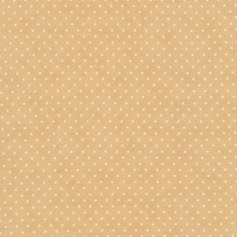 This Moda fabric features a light tan background with off white polka dots