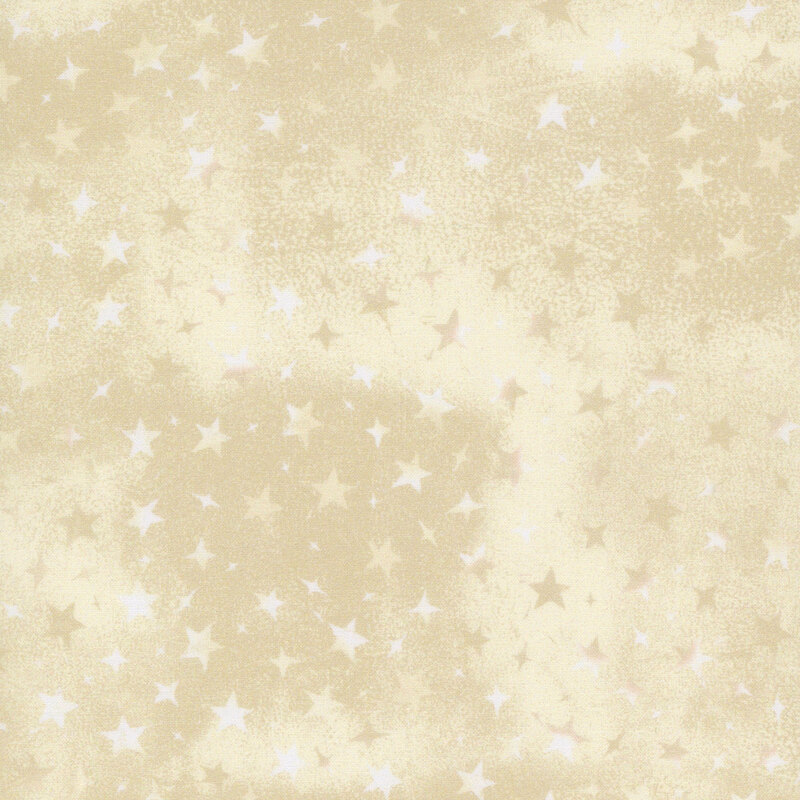 tan mottled fabric with variegated stars in different sizes