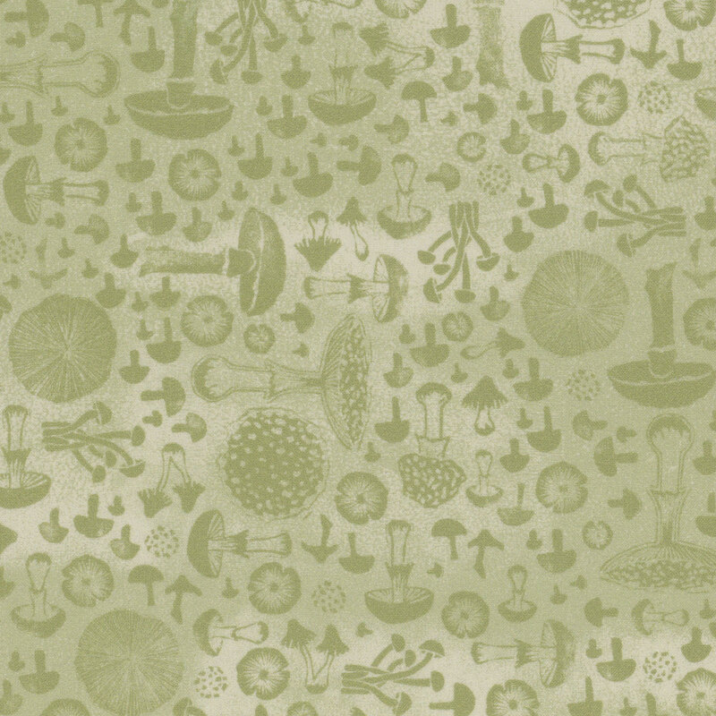 Pale green fabric with tonal mushrooms of all kinds angled at 90 degree angles from one another