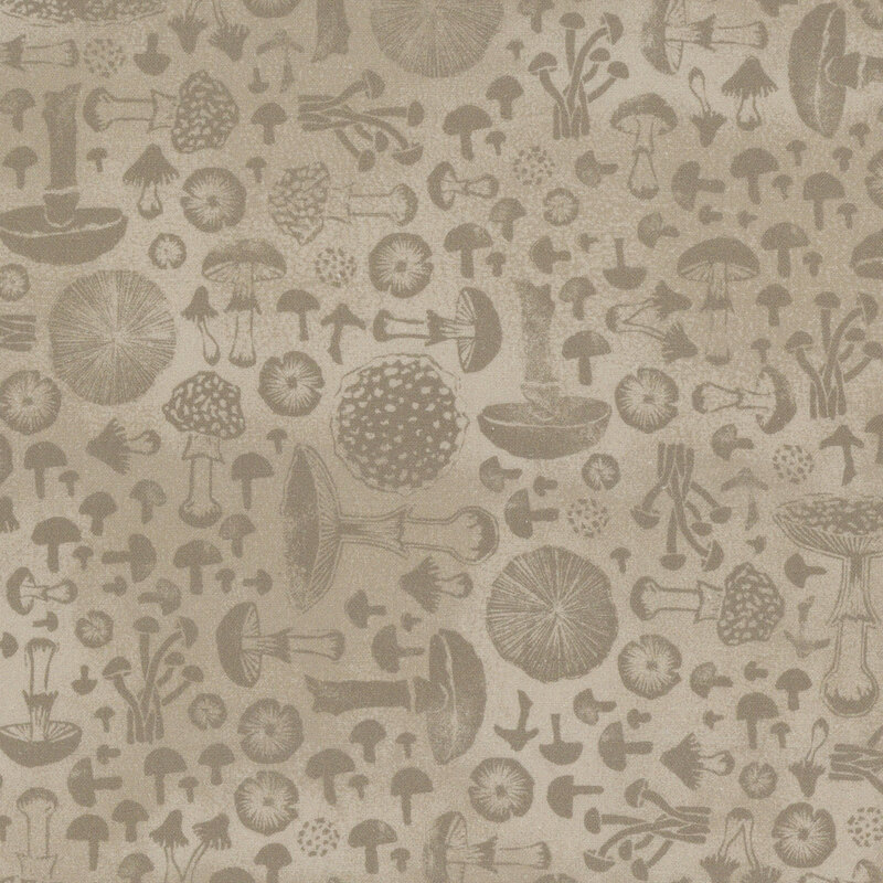 Pale sepia fabric with tonal mushrooms of all kinds angled at 90 degree angles from one another