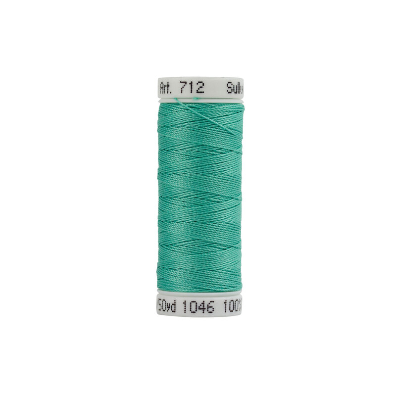 A spool of beautiful teal thread - Sulky Cotton Petites #1046 - Teal