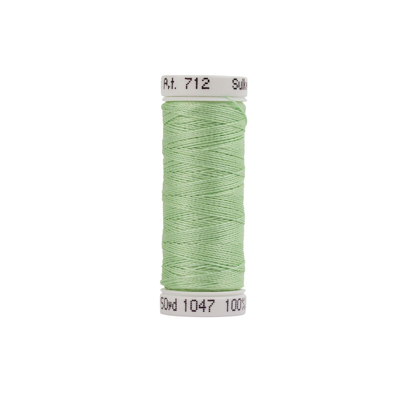 Close up image of Sulky 12wt mint green thread spool against a white background