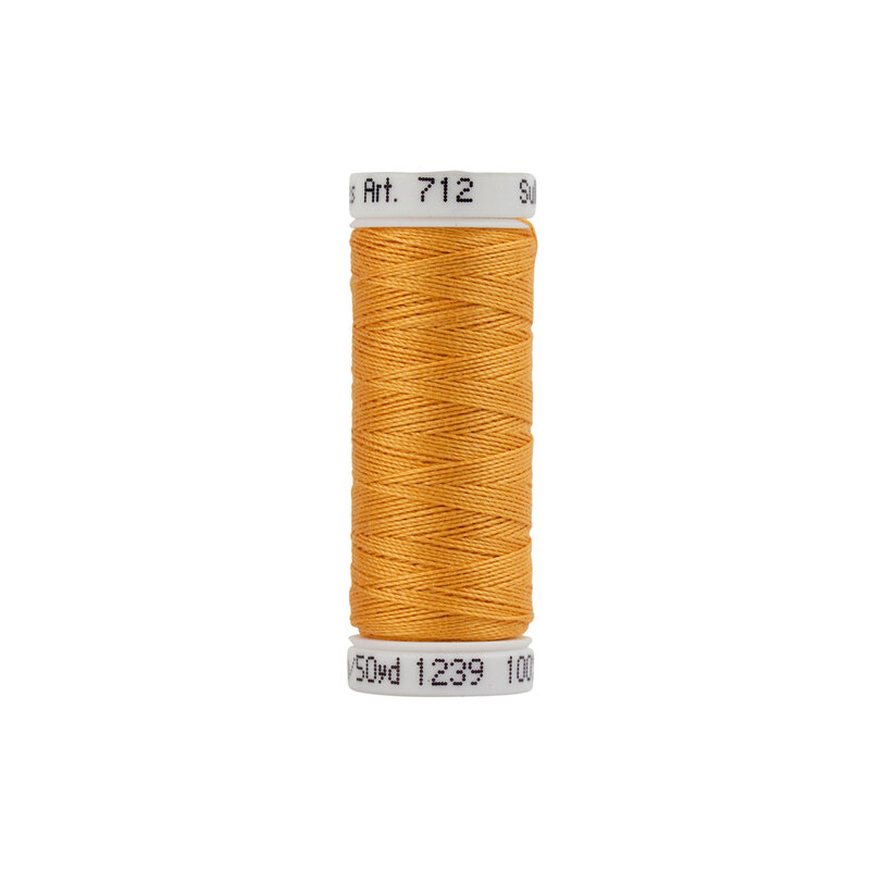 A spool of Sulky 12wt Cotton Petite #1239 Apricot thread on a white background