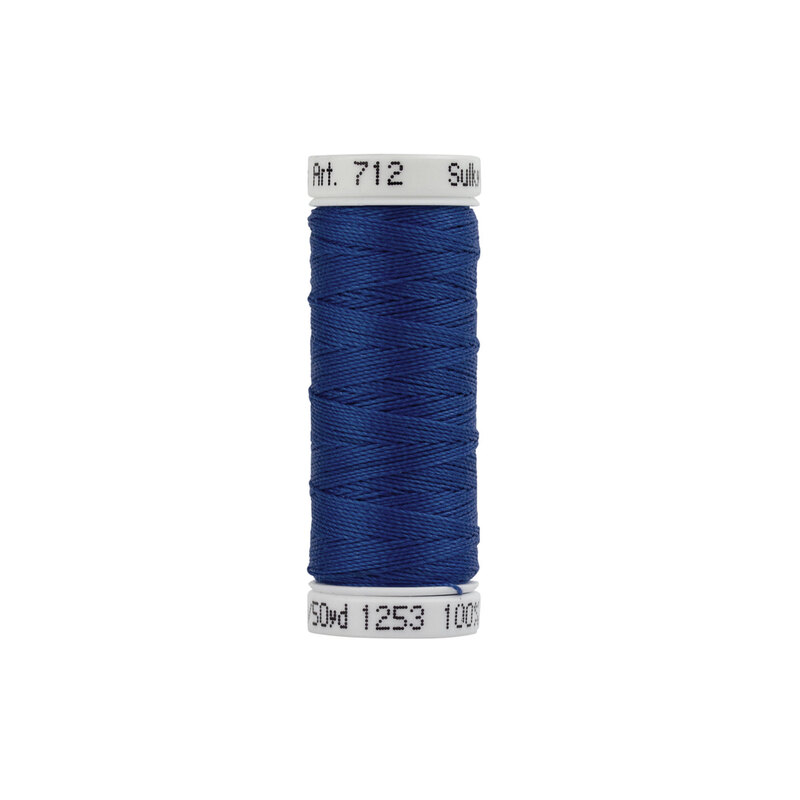 Single isolated spool of Sulky Cotton Petites Thread 712-1253 Dark Sapphire on a white background
