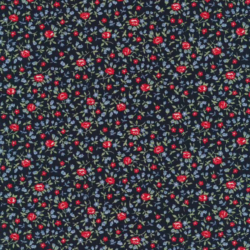 Navy fabric with tiny red flowers with green leaves packed together