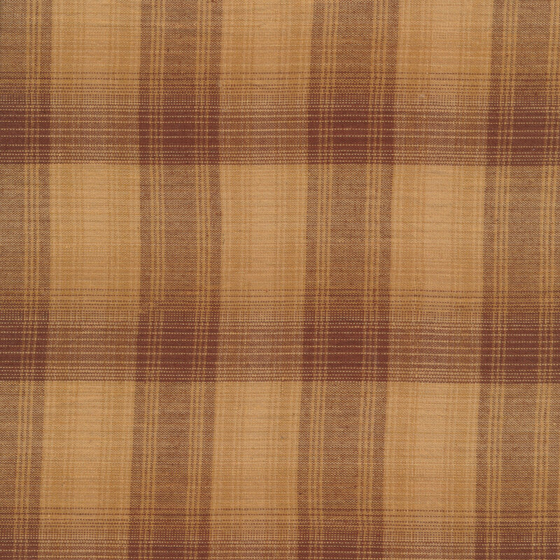 Brown and tan plaid design with reds throughout