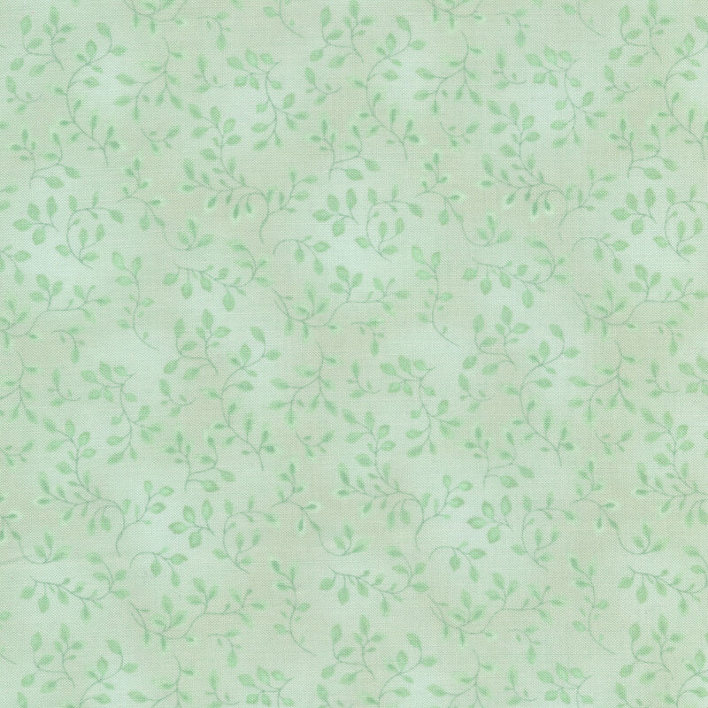 Light green tonal fabric with vines and mottling