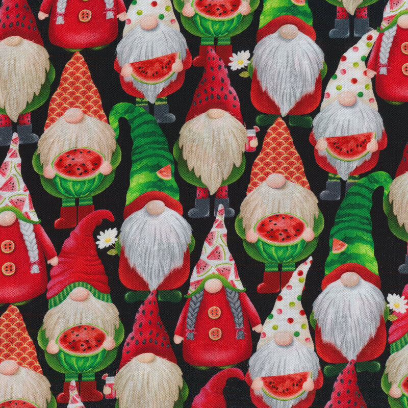 Black fabric featuring male and female gnomes wearing watermelon themed clothing, holding watermelon halves and slices