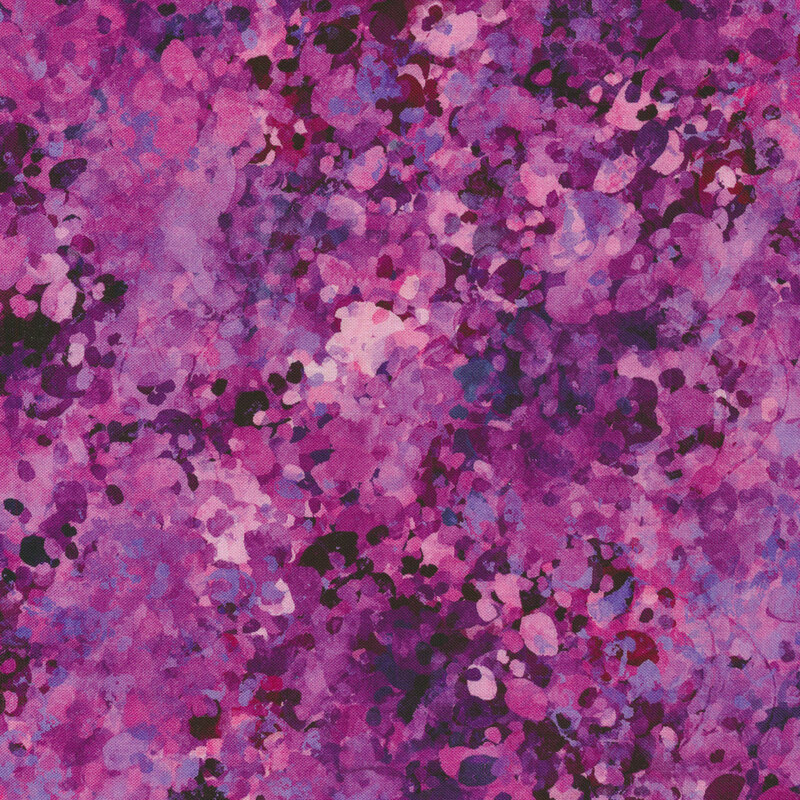 Purple pink textured fabric with spots of white and purple