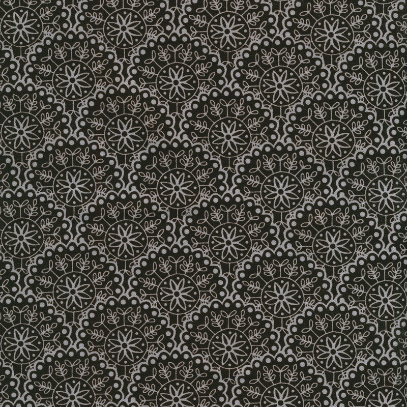 Fabric with black scallops and grey flowers and leaves 