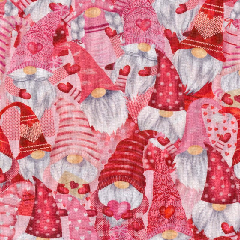 Packed gnomes holding love letters and hearts wearing pink, red and white