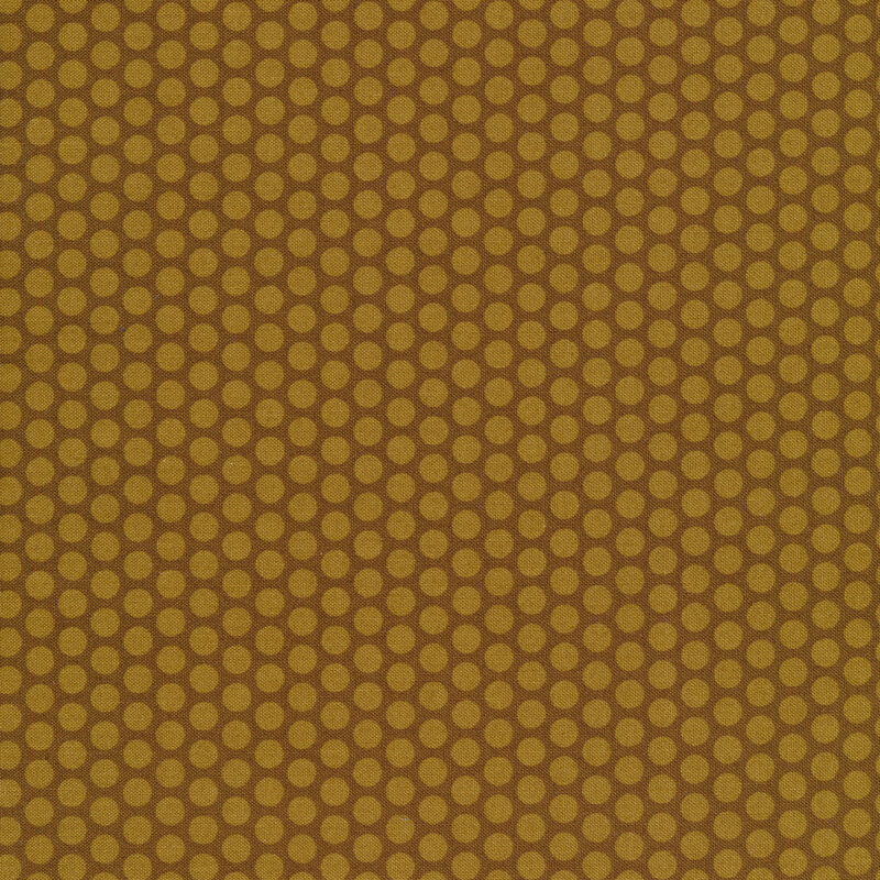 Tonal light tan polka dots all over a dark brown