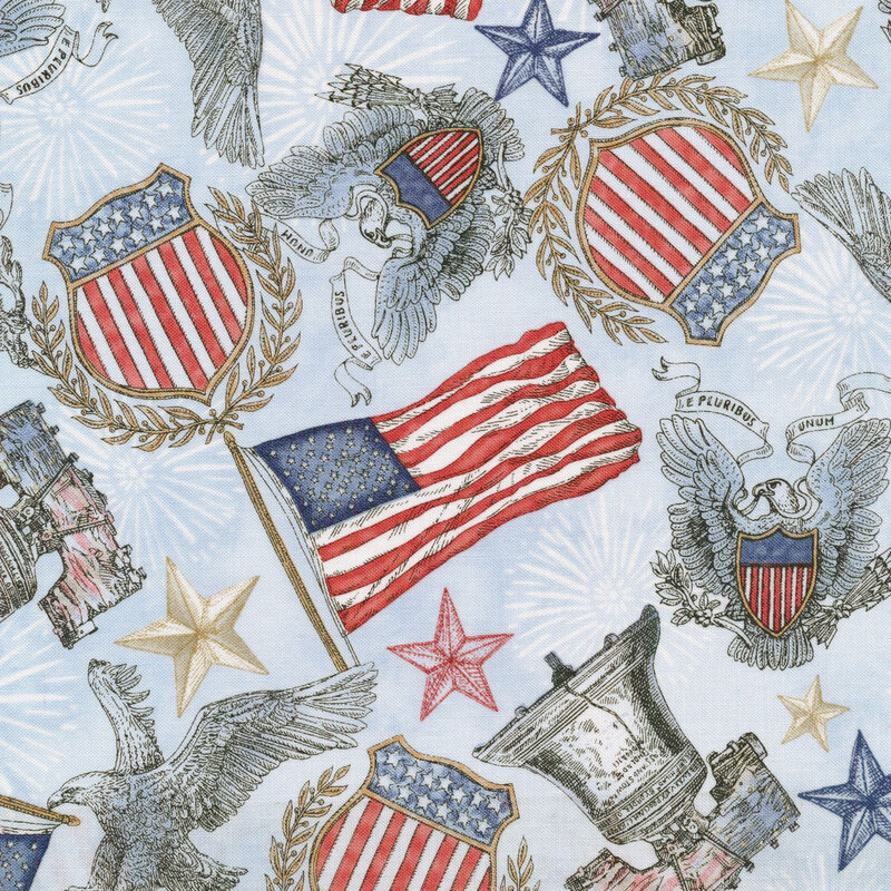 Blue mottled fabric with American flags, liberty bells, shields, stars, and american eagles all over