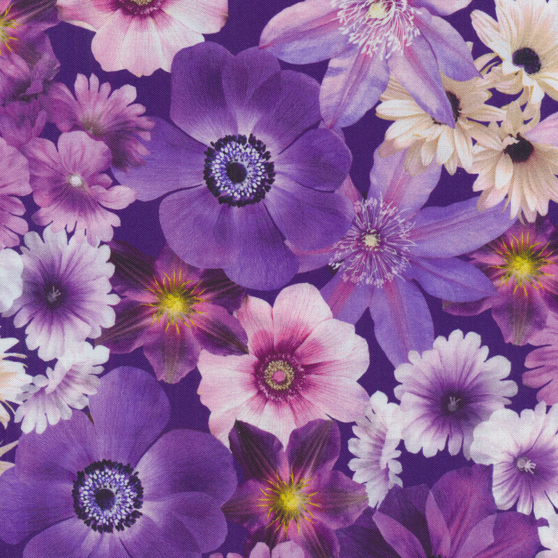 Dark purple fabric with packed purple and pink flowers all over
