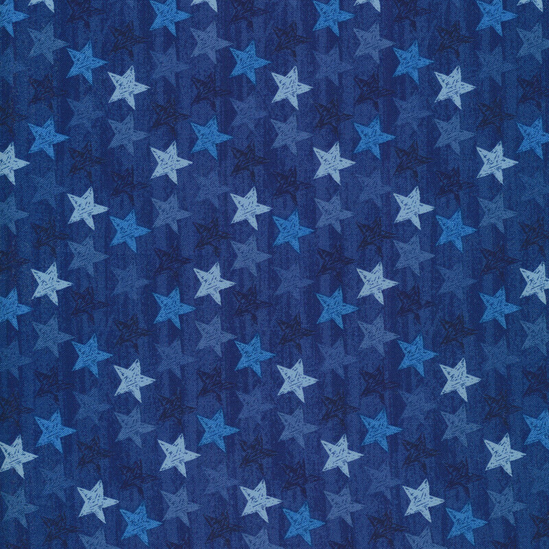 Blue fabric with stars all over in varying shades of blue