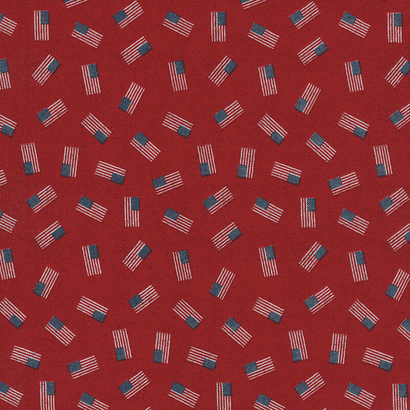 red fabric with red white and blue American flags tossed