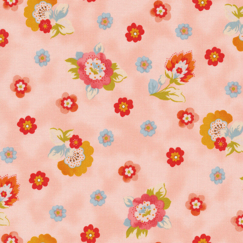 Light pink fabric with red and blue tossed flowers