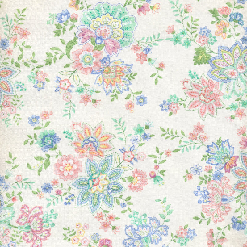 fabric with pink and blue flowers on a cream background 