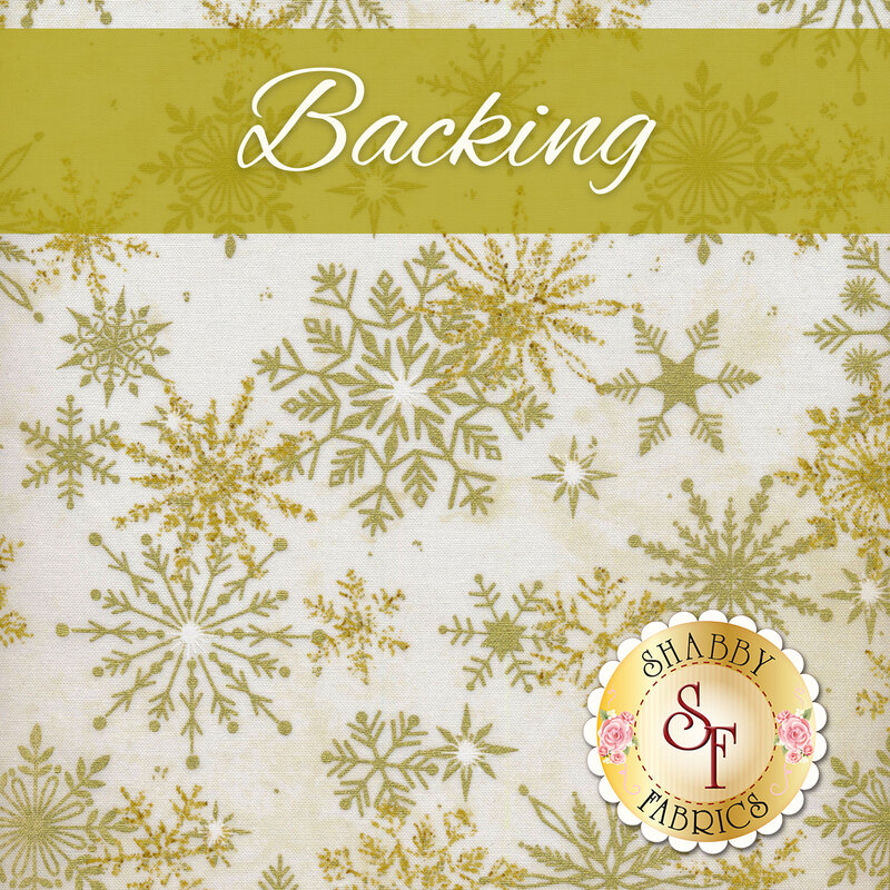A swatch of cream fabric with tossed metallic gold snowflakes. A gold banner at the top reads 