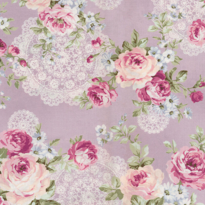 cream and pink roses on a light purple background with cream lace
