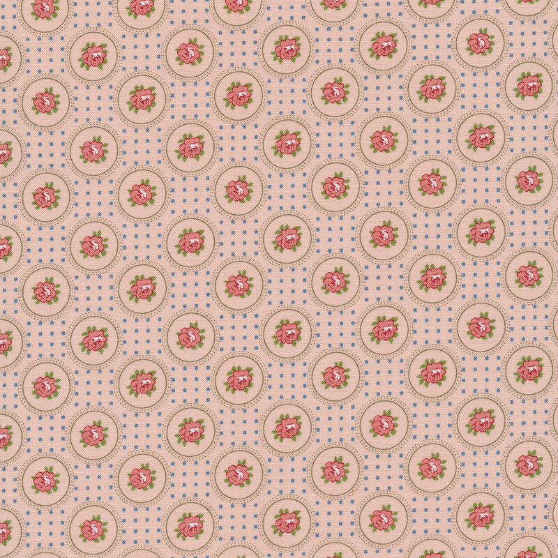 dusty pink fabric with pink roses encircled by thin brown lines, each separated by blue dots in the shape of a square