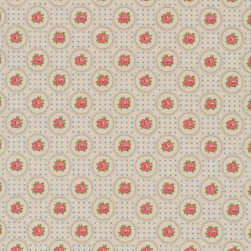 light green/taupe fabric with pink roses encircled by thin brown lines, each separated by blue dots in the shape of a square