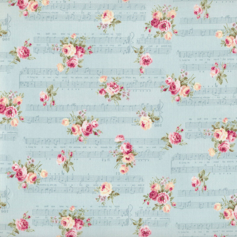 cream and pink flowers on a light blue background with antique sheet music 