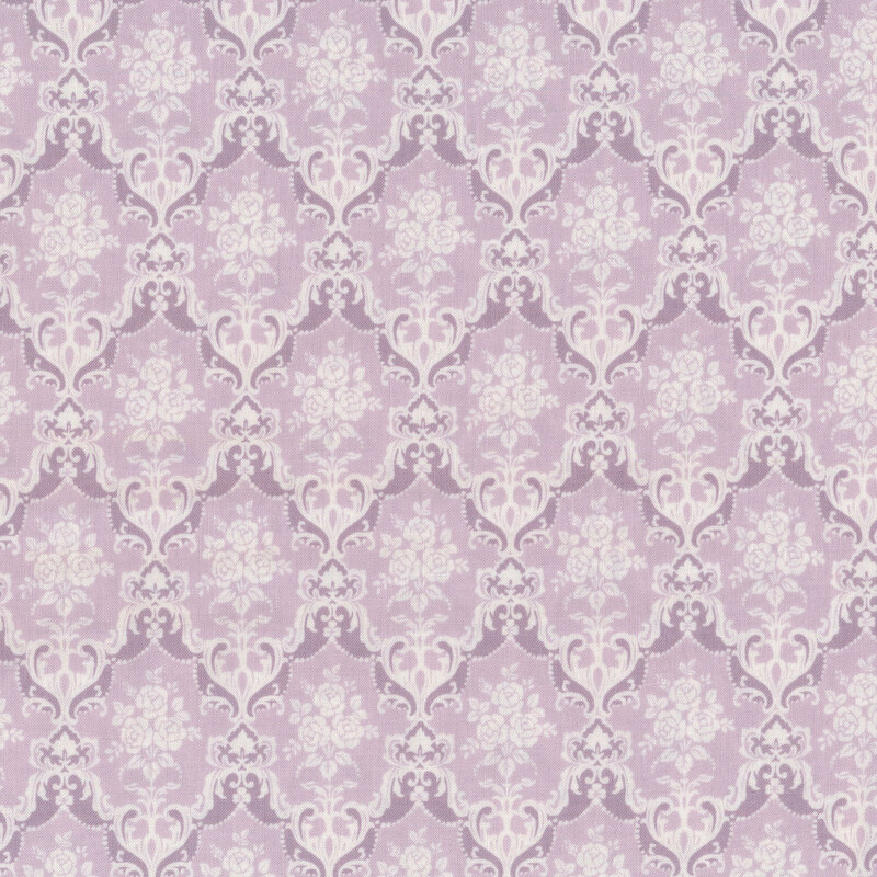 cream roses framed by cream victorian scrolls repeating on a light purple background