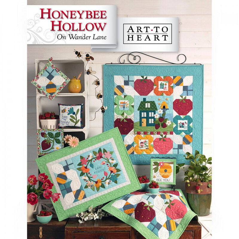 front of Honeybee Hollow block pattern book, showing finished block and additional finished projects