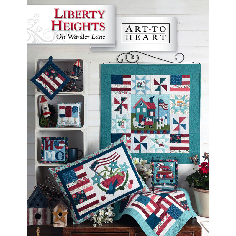 front of Liberty Heights block pattern book, showing finished block and additional finished projects