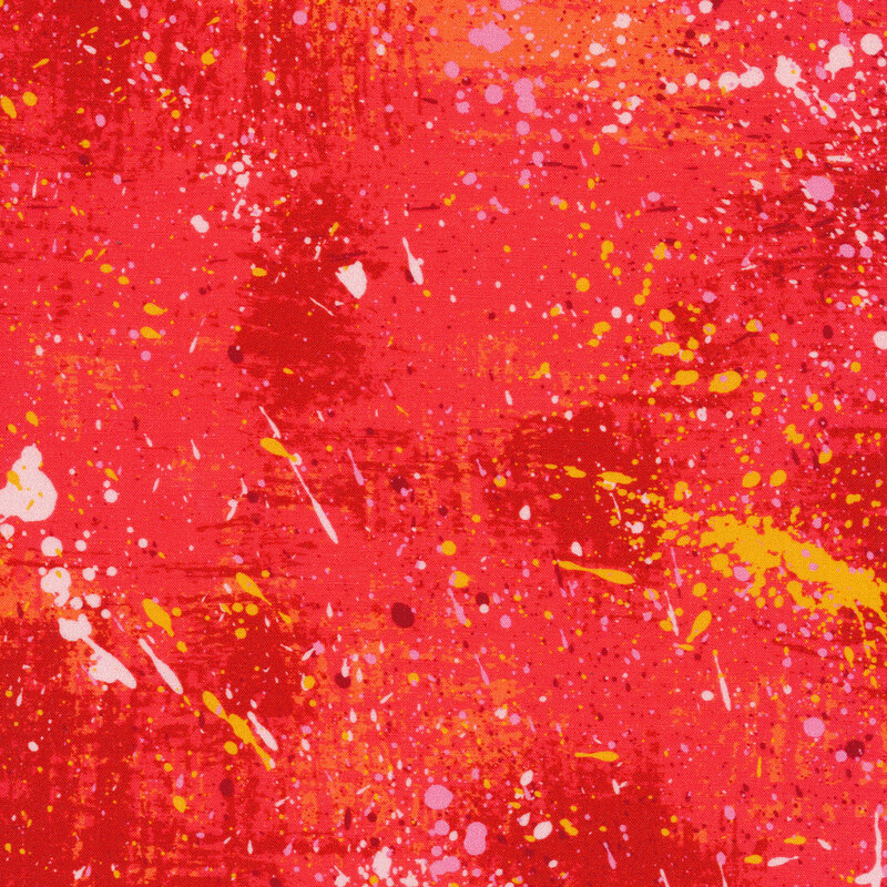 white and gold splatters on a red grunge background