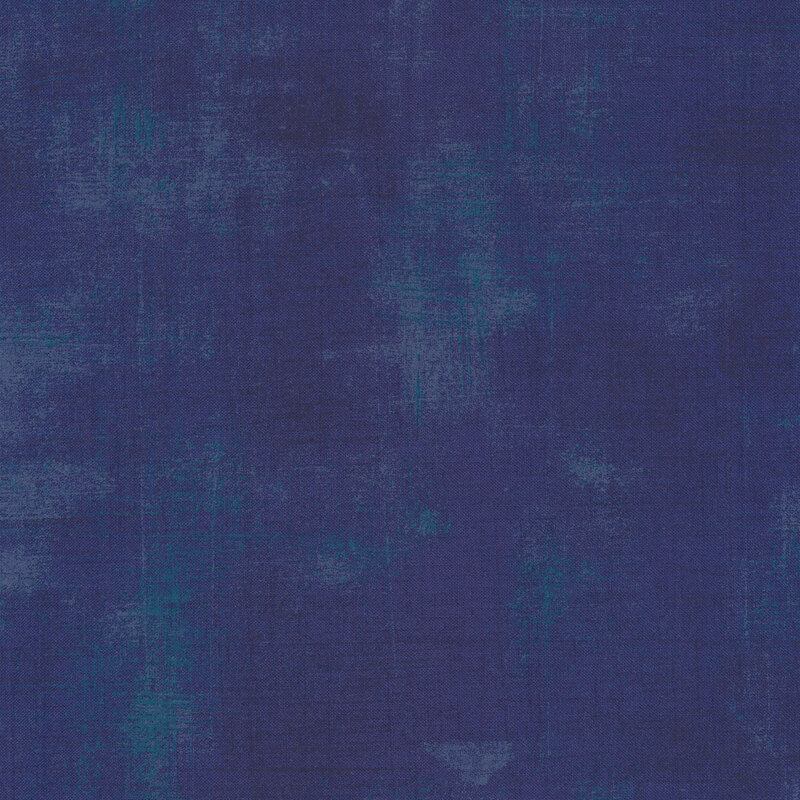 a bold royal blue fabric with light teal and grey grunge texturing
