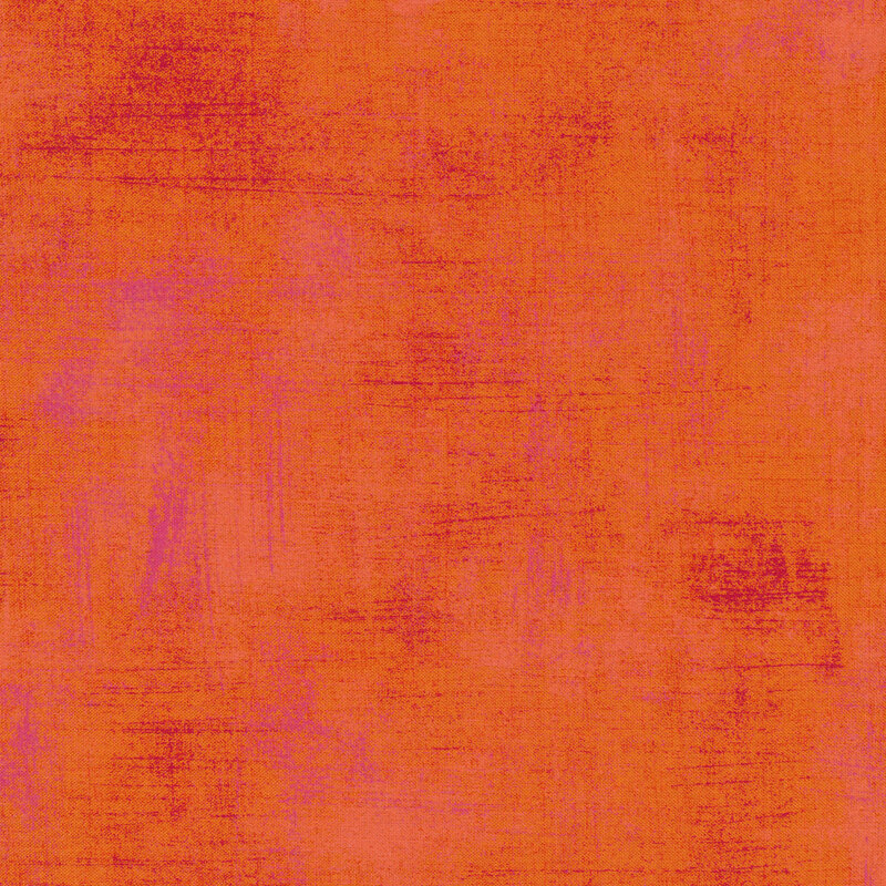 bright orange fabric with pink and red texturing