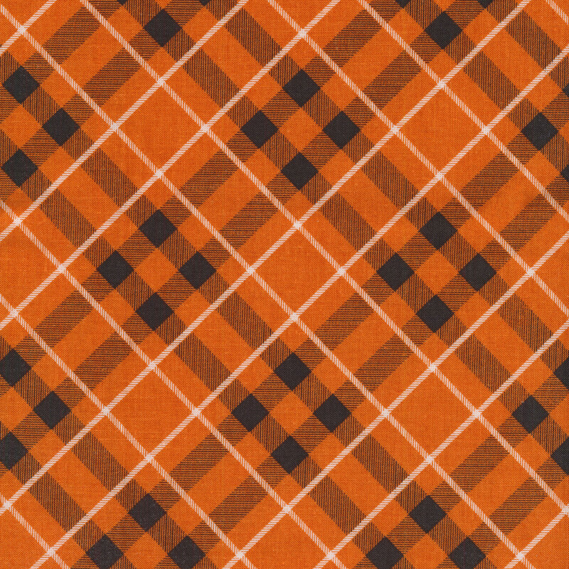 orange plaid fabric with black and white intersecting lines