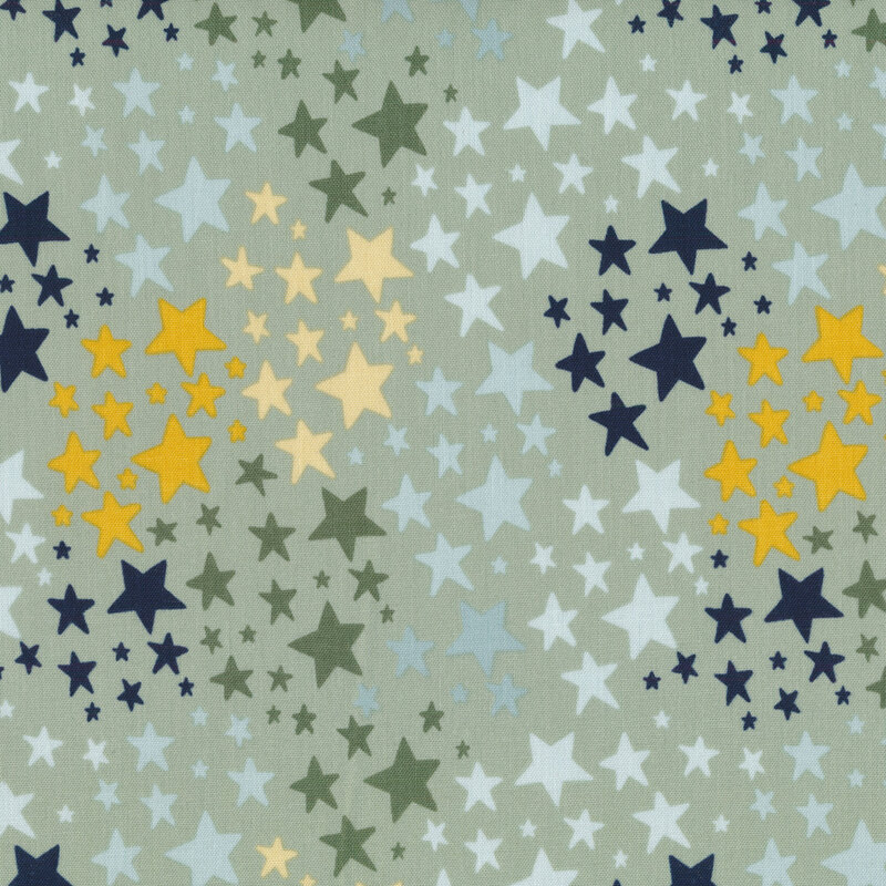 Light sage green fabric with colorful stars all over