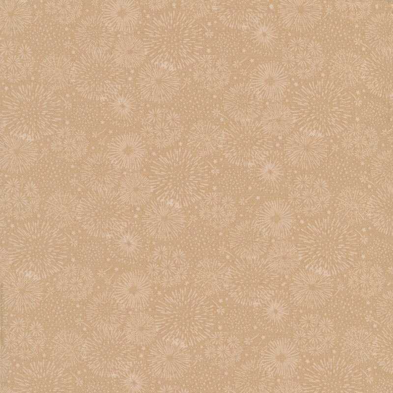 fabric with a tonal print of tan fireworks