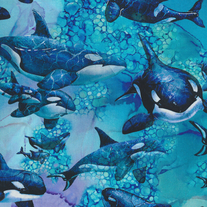 Fabric with marbling and stylized ocean floor with a pod of orcas swimming in all directions