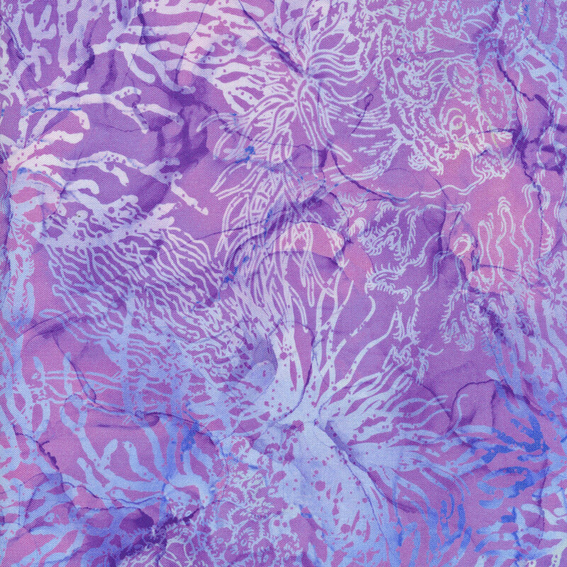 blue and purple abstract marbled fabric with light, tonal coral and anemone patterns