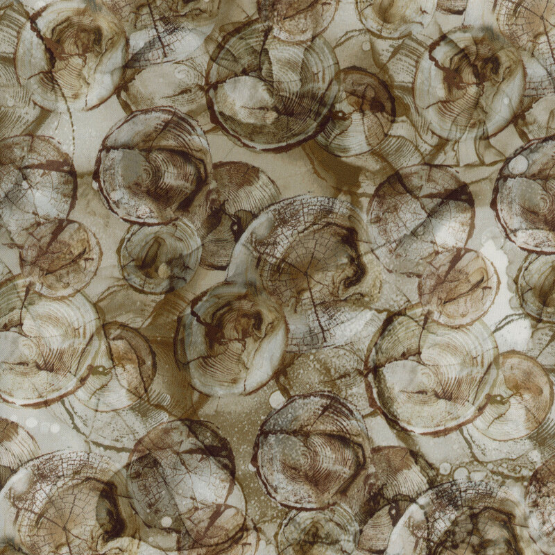 Fabric with marbled tree rings on a light tan background