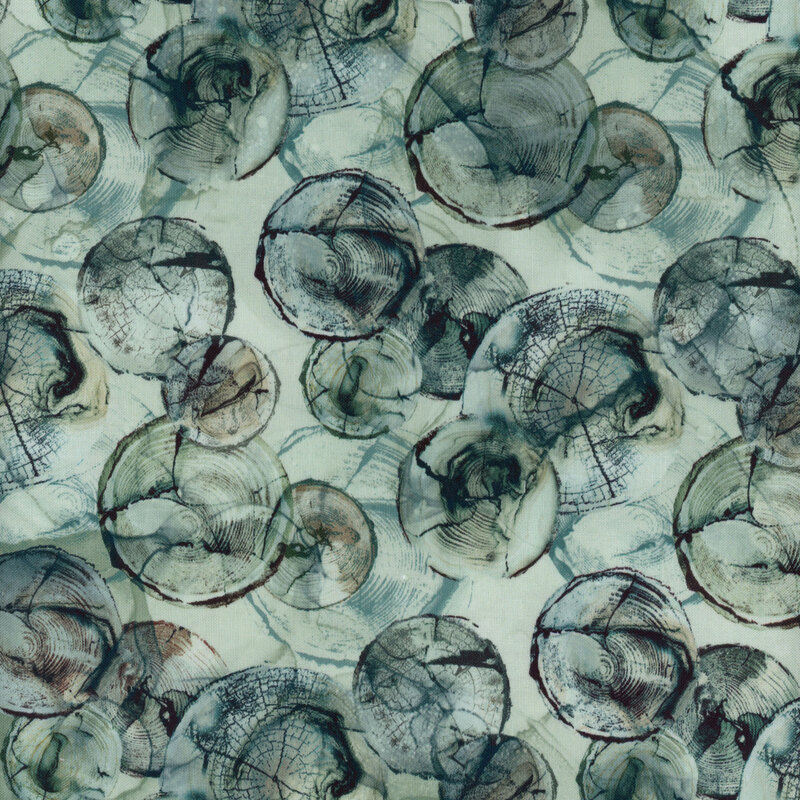Fabric with marbled tree rings on a green background