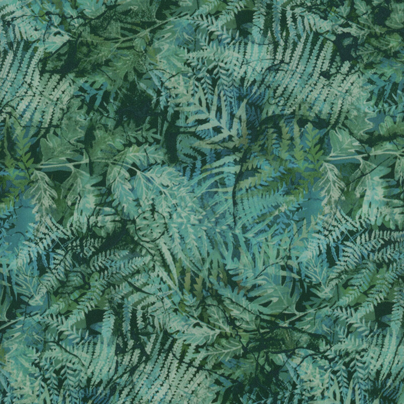 Fabric with marbled blue and teal fern leaves on a deep green background