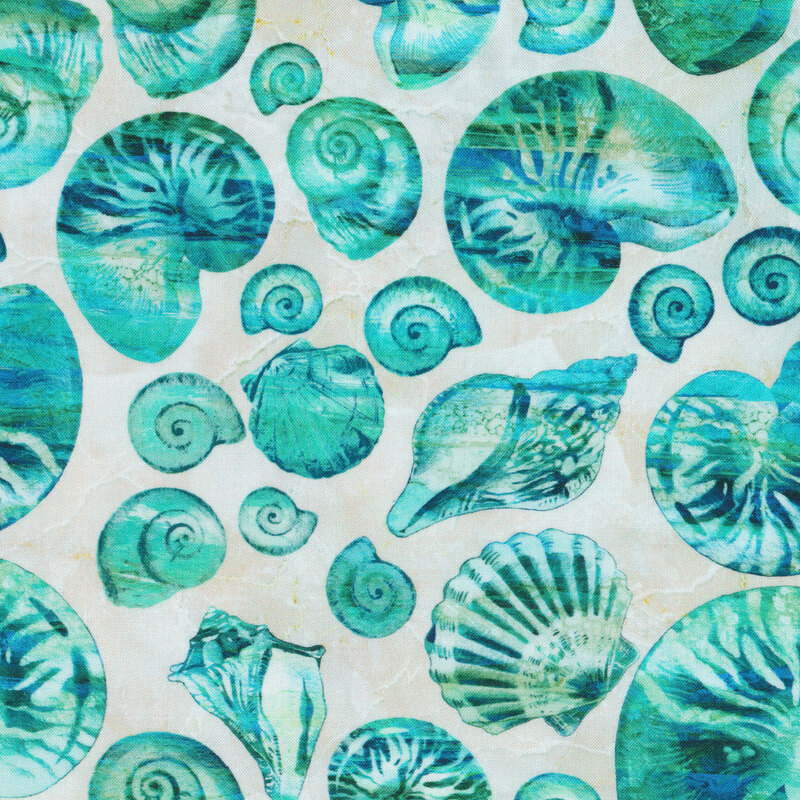 Fabric with marbled teal sea shells tossed on a cream background
