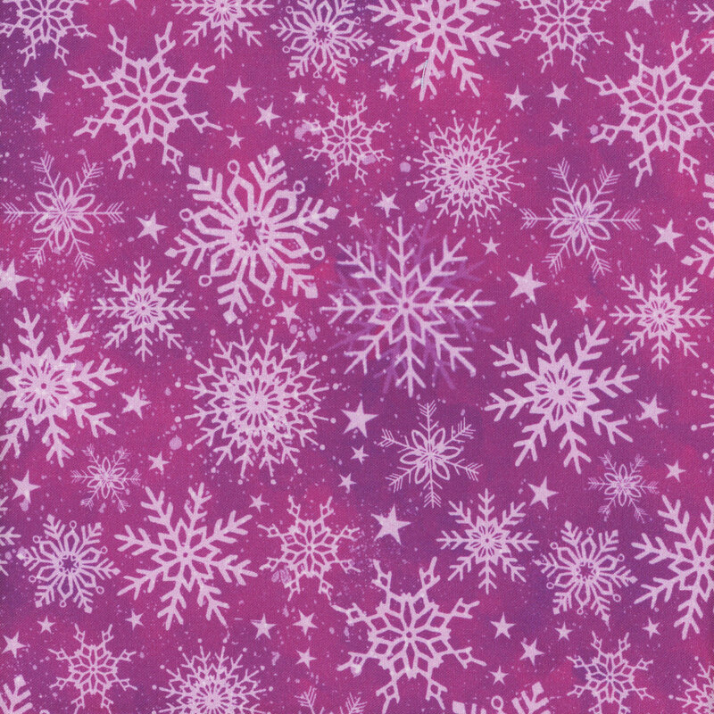 variegated pink/purple fabric with white snowflakes and stars all over