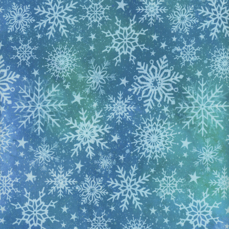 variegated teal/blue fabric with white snowflakes and stars all over