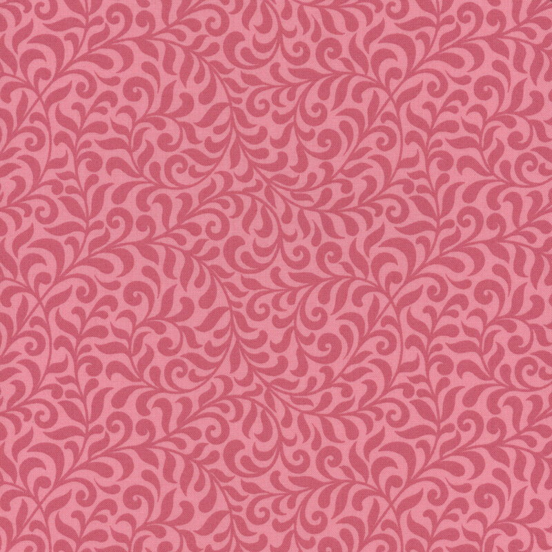 fabric featuring dark pink swirls on a light pink background